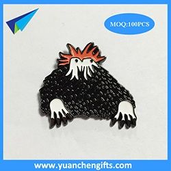 Black metal badge with soft enamel