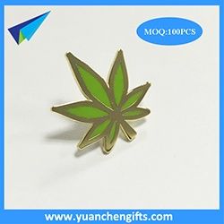 Gold plated leaf lapel pin