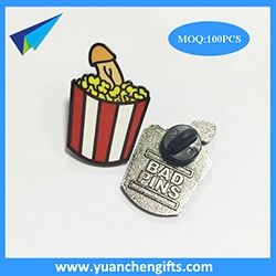 Hard enamel pins with logo stamped on backside