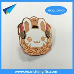 Rose gold pin badge