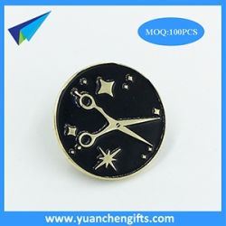 Gold plated black enamel lapel pin