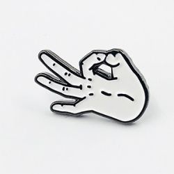 ok figure enamel pin